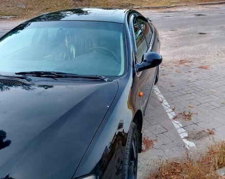 Черный Крайслер 300М, объемом двигателя 2.7 л и пробегом 408 тыс. км за 3500 $, фото 1 на Automoto.ua