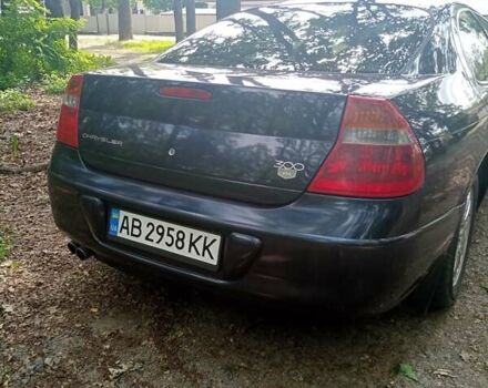 Синий Крайслер 300М, объемом двигателя 2.74 л и пробегом 250 тыс. км за 3700 $, фото 1 на Automoto.ua