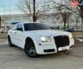 Белый Крайслер 300, объемом двигателя 3.52 л и пробегом 250 тыс. км за 9990 $, фото 1 на Automoto.ua