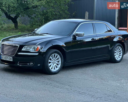 Чорний Крайслер 300, об'ємом двигуна 3.6 л та пробігом 206 тис. км за 10900 $, фото 1 на Automoto.ua