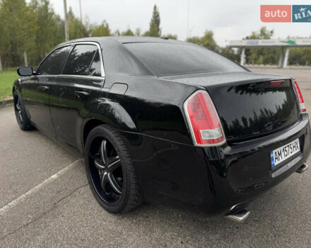 Чорний Крайслер 300, об'ємом двигуна 3.6 л та пробігом 282 тис. км за 10500 $, фото 13 на Automoto.ua