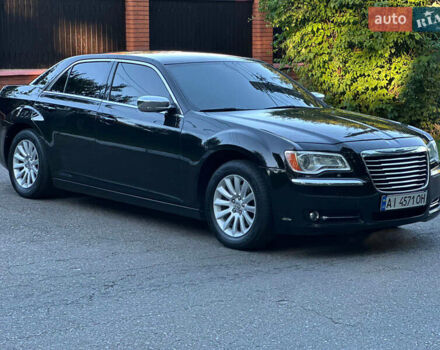 Черный Крайслер 300, объемом двигателя 3.6 л и пробегом 206 тыс. км за 10900 $, фото 1 на Automoto.ua