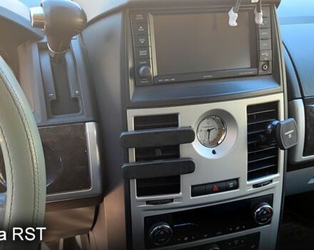 Белый Крайслер Гранд Вояджер, объемом двигателя 2.8 л и пробегом 250 тыс. км за 12350 $, фото 4 на Automoto.ua