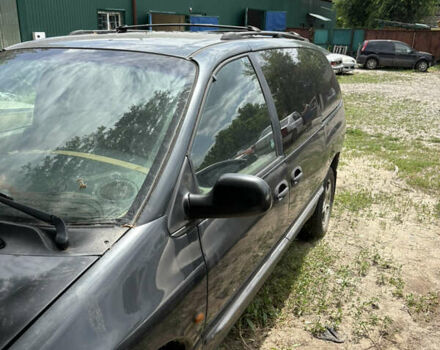 Черный Крайслер Гранд Вояджер, объемом двигателя 2.5 л и пробегом 392 тыс. км за 3100 $, фото 1 на Automoto.ua