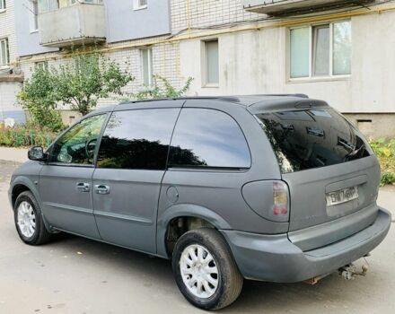 Черный Крайслер Гранд Вояджер, объемом двигателя 2.5 л и пробегом 347 тыс. км за 1650 $, фото 4 на Automoto.ua