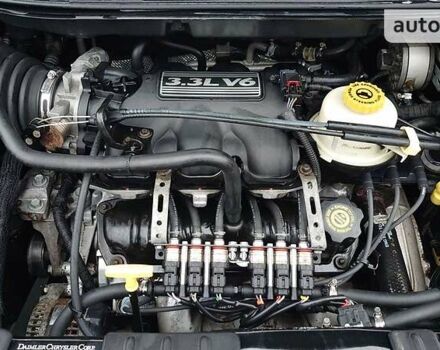 Черный Крайслер Гранд Вояджер, объемом двигателя 3.3 л и пробегом 310 тыс. км за 5200 $, фото 13 на Automoto.ua