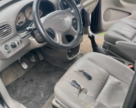 Черный Крайслер Гранд Вояджер, объемом двигателя 2.5 л и пробегом 276 тыс. км за 1593 $, фото 5 на Automoto.ua