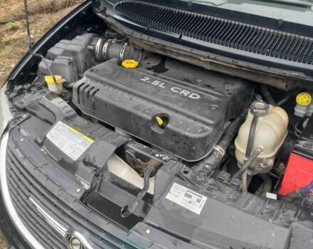 Черный Крайслер Гранд Вояджер, объемом двигателя 2.5 л и пробегом 276 тыс. км за 1593 $, фото 7 на Automoto.ua