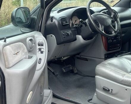 Крайслер Гранд Вояджер 2005 в Могилев-Подольском на Automoto.ua Черный Крайслер Гранд Вояджер, объемом двигателя 2.8 л и пробегом 280 тыс. км за 5900 $, фото 5 на Automoto.ua