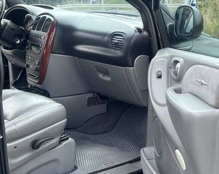 Крайслер Гранд Вояджер 2005 в Могилев-Подольском на Automoto.ua Черный Крайслер Гранд Вояджер, объемом двигателя 2.8 л и пробегом 280 тыс. км за 5900 $, фото 5 на Automoto.ua