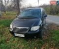 Черный Крайслер Гранд Вояджер, объемом двигателя 2.8 л и пробегом 270 тыс. км за 6200 $, фото 1 на Automoto.ua