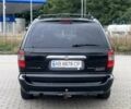 Крайслер Гранд Вояджер 2005 в Могилев-Подольском на Automoto.ua Черный Крайслер Гранд Вояджер, объемом двигателя 2.8 л и пробегом 280 тыс. км за 5900 $, фото 4 на Automoto.ua