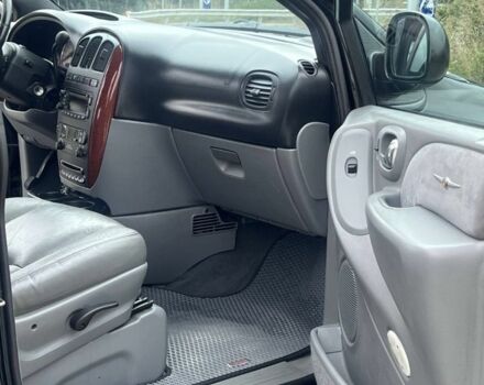 Крайслер Гранд Вояджер 2005 в Могилев-Подольском на Automoto.ua Черный Крайслер Гранд Вояджер, объемом двигателя 2.8 л и пробегом 280 тыс. км за 5900 $, фото 6 на Automoto.ua