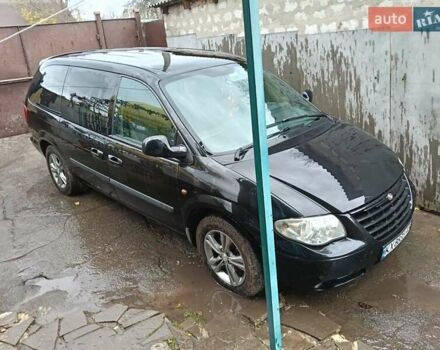 Черный Крайслер Гранд Вояджер, объемом двигателя 2.78 л и пробегом 326 тыс. км за 5000 $, фото 6 на Automoto.ua