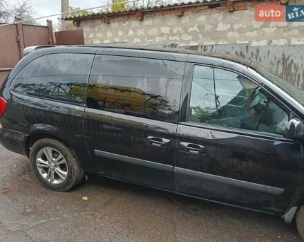 Черный Крайслер Гранд Вояджер, объемом двигателя 2.78 л и пробегом 326 тыс. км за 5000 $, фото 1 на Automoto.ua