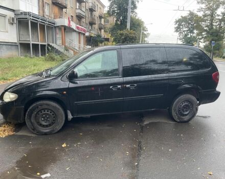 Черный Крайслер Гранд Вояджер, объемом двигателя 0 л и пробегом 200 тыс. км за 3093 $, фото 1 на Automoto.ua