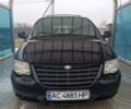 Черный Крайслер Гранд Вояджер, объемом двигателя 2.8 л и пробегом 425 тыс. км за 3819 $, фото 1 на Automoto.ua