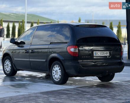 Черный Крайслер Гранд Вояджер, объемом двигателя 2.5 л и пробегом 320 тыс. км за 2999 $, фото 2 на Automoto.ua