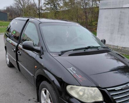 Черный Крайслер Гранд Вояджер, объемом двигателя 2.8 л и пробегом 334 тыс. км за 6000 $, фото 3 на Automoto.ua