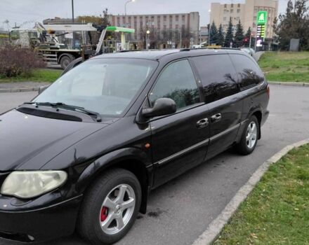 Черный Крайслер Гранд Вояджер, объемом двигателя 2.8 л и пробегом 334 тыс. км за 6000 $, фото 2 на Automoto.ua