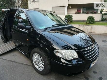 Чорний Крайслер Grand Voyager, об'ємом двигуна 0.28 л та пробігом 244 тис. км за 12950 $, фото 1 на Automoto.ua