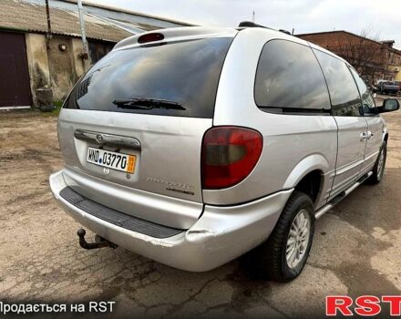 Серый Крайслер Гранд Вояджер, объемом двигателя 2.5 л и пробегом 289 тыс. км за 2500 $, фото 5 на Automoto.ua