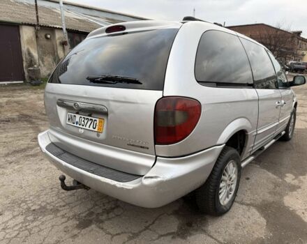 Серый Крайслер Гранд Вояджер, объемом двигателя 2.5 л и пробегом 289 тыс. км за 2541 $, фото 5 на Automoto.ua