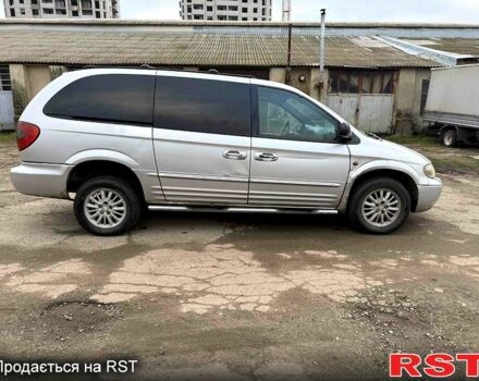 Серый Крайслер Гранд Вояджер, объемом двигателя 2.5 л и пробегом 289 тыс. км за 2500 $, фото 4 на Automoto.ua