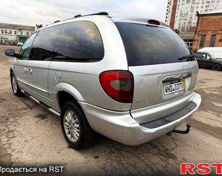 Серый Крайслер Гранд Вояджер, объемом двигателя 2.5 л и пробегом 289 тыс. км за 2500 $, фото 2 на Automoto.ua