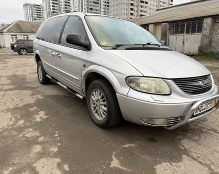 Серый Крайслер Гранд Вояджер, объемом двигателя 2.5 л и пробегом 289 тыс. км за 2541 $, фото 3 на Automoto.ua