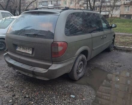 Серый Крайслер Гранд Вояджер, объемом двигателя 2.8 л и пробегом 300 тыс. км за 5500 $, фото 1 на Automoto.ua