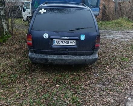 Синий Крайслер Гранд Вояджер, объемом двигателя 2.5 л и пробегом 350 тыс. км за 999 $, фото 1 на Automoto.ua