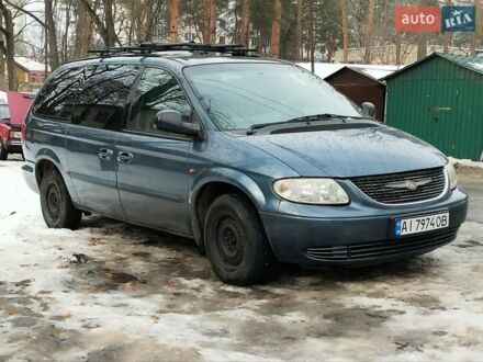 Синий Крайслер Гранд Вояджер, объемом двигателя 3.3 л и пробегом 298 тыс. км за 4999 $, фото 1 на Automoto.ua