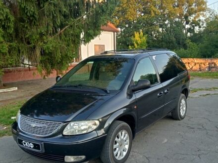 Синій Крайслер Grand Voyager, об'ємом двигуна 2.5 л та пробігом 278 тис. км за 3619 $, фото 1 на Automoto.ua