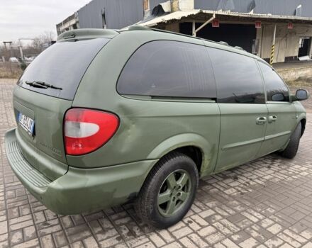 Зеленый Крайслер Гранд Вояджер, объемом двигателя 2.5 л и пробегом 330 тыс. км за 2606 $, фото 6 на Automoto.ua