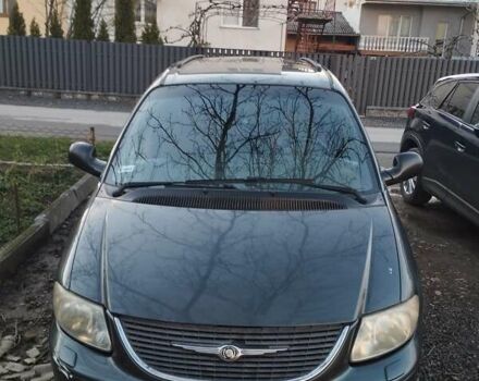 Зеленый Крайслер Гранд Вояджер, объемом двигателя 2.5 л и пробегом 380 тыс. км за 3900 $, фото 1 на Automoto.ua