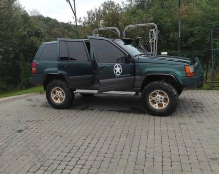 Зеленый Крайслер Джип Чероки, объемом двигателя 2.5 л и пробегом 200 тыс. км за 4500 $, фото 12 на Automoto.ua