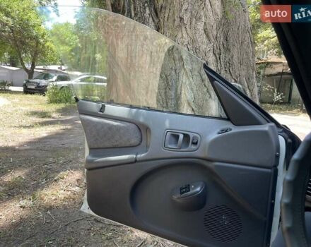Білий Крайслер Neon, об'ємом двигуна 2 л та пробігом 273 тис. км за 4000 $, фото 6 на Automoto.ua