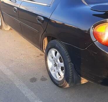 Черный Крайслер Неон, объемом двигателя 2 л и пробегом 265 тыс. км за 4500 $, фото 7 на Automoto.ua