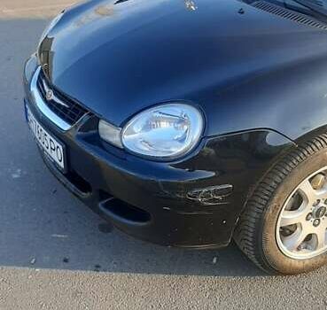 Черный Крайслер Неон, объемом двигателя 2 л и пробегом 265 тыс. км за 4500 $, фото 2 на Automoto.ua