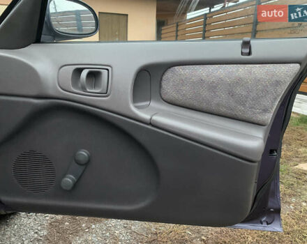 Фіолетовий Крайслер Neon, об'ємом двигуна 2 л та пробігом 187 тис. км за 2650 $, фото 21 на Automoto.ua