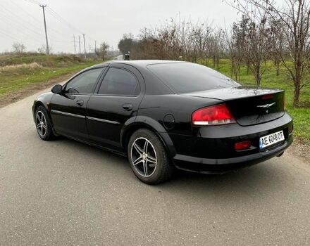 Черный Крайслер Себринг, объемом двигателя 2 л и пробегом 290 тыс. км за 3950 $, фото 4 на Automoto.ua