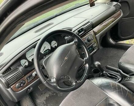 Черный Крайслер Себринг, объемом двигателя 2 л и пробегом 290 тыс. км за 3900 $, фото 4 на Automoto.ua