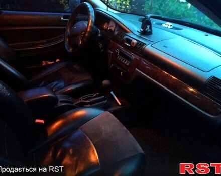 Черный Крайслер Себринг, объемом двигателя 2.7 л и пробегом 250 тыс. км за 3500 $, фото 5 на Automoto.ua