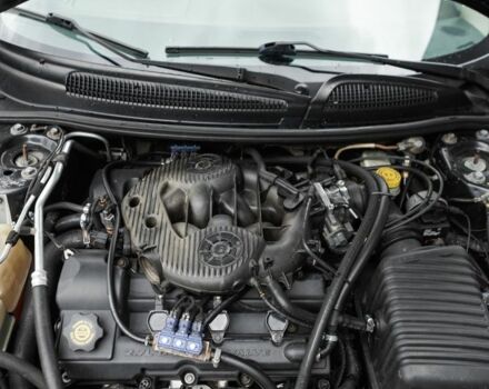 Черный Крайслер Себринг, объемом двигателя 2.7 л и пробегом 255 тыс. км за 2500 $, фото 1 на Automoto.ua