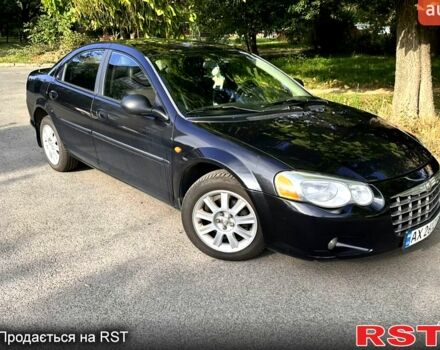 Черный Крайслер Себринг, объемом двигателя 2 л и пробегом 257 тыс. км за 4300 $, фото 1 на Automoto.ua