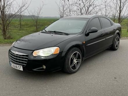 Черный Крайслер Себринг, объемом двигателя 2 л и пробегом 290 тыс. км за 3900 $, фото 1 на Automoto.ua