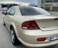 Жовтий Крайслер Себрінг, об'ємом двигуна 2.7 л та пробігом 250 тис. км за 3500 $, фото 3 на Automoto.ua
