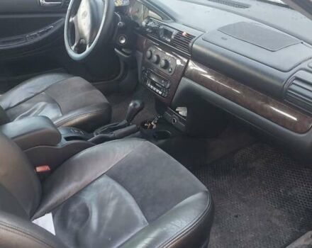 Крайслер Себрінг 2003 у Голованевске на Automoto.ua Сірий Крайслер Себрінг, об'ємом двигуна 2 л та пробігом 175 тис. км за 2399 $, фото 14 на Automoto.ua