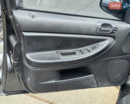 Сірий Крайслер Себрінг, об'ємом двигуна 2 л та пробігом 200 тис. км за 2500 $, фото 9 на Automoto.ua